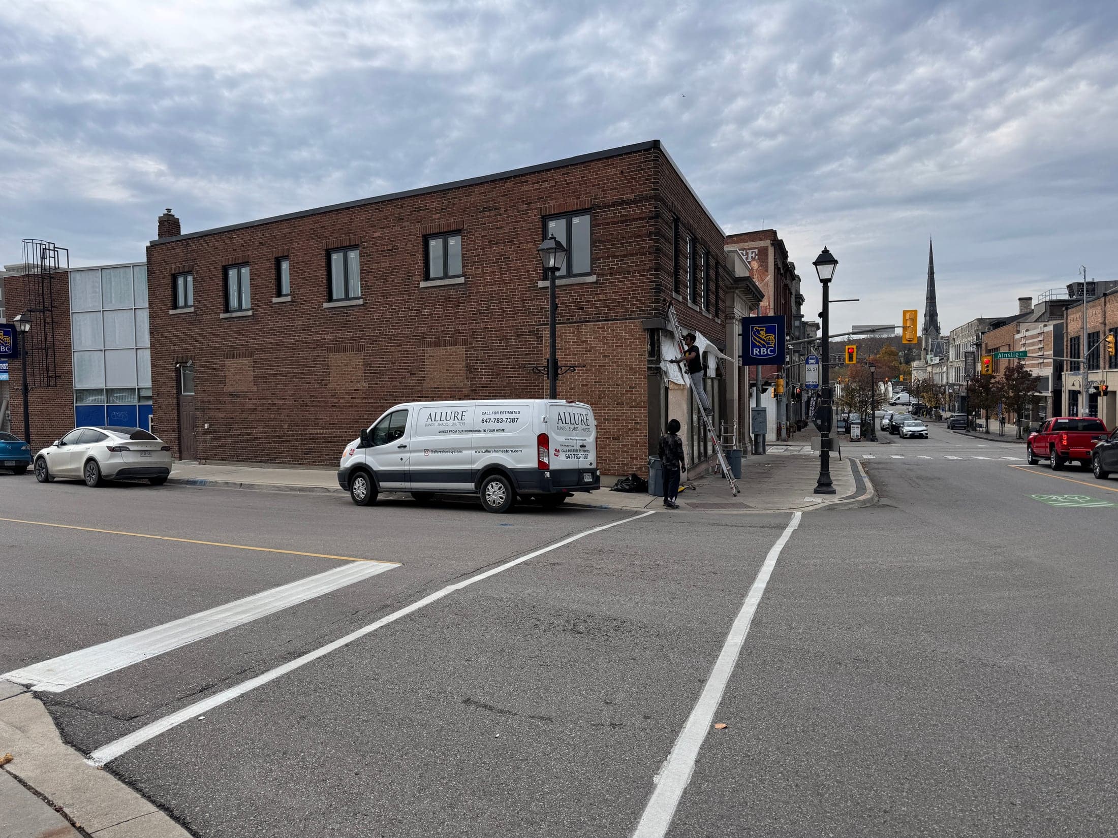 Brick mixed-use building under renovation in downtown Cambridge